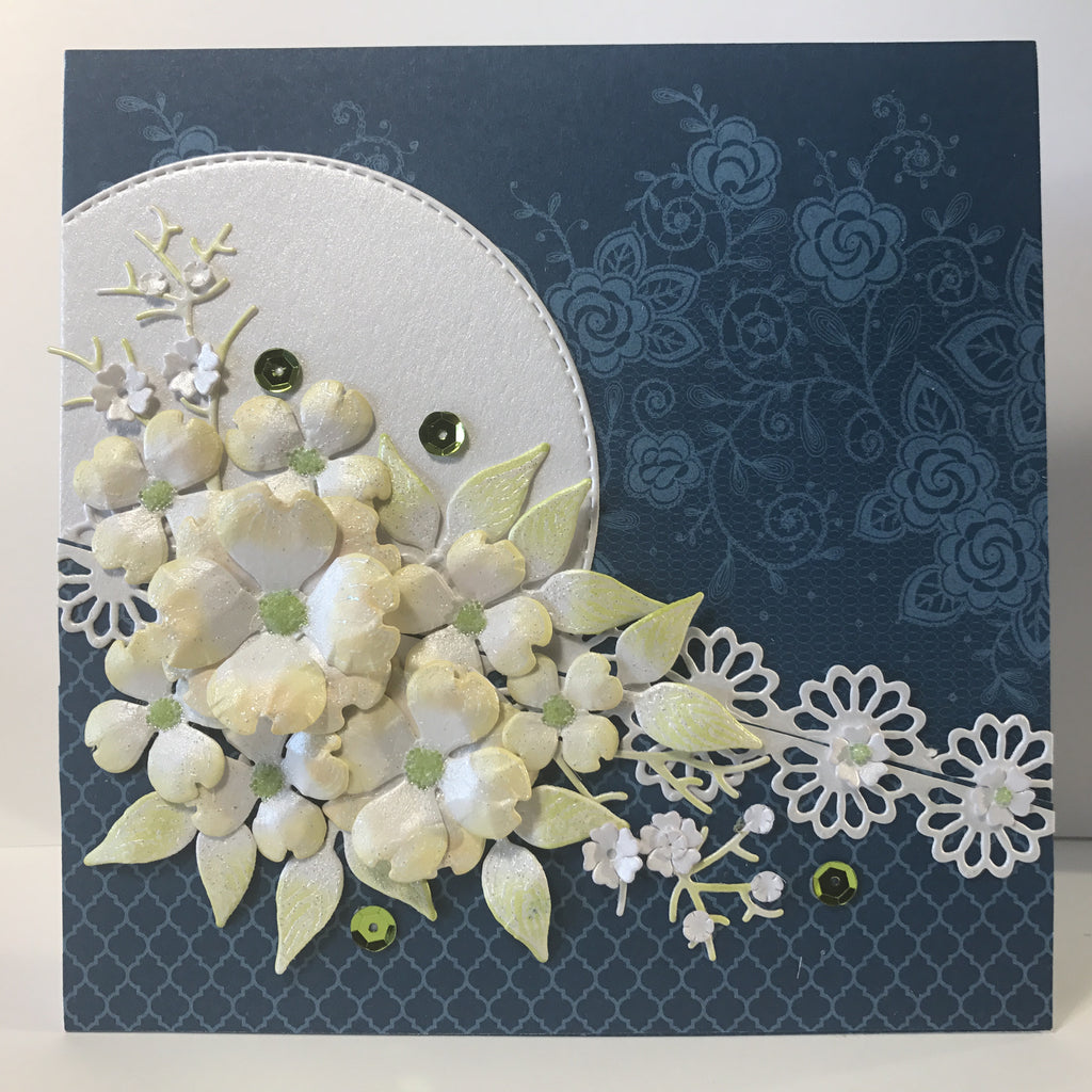Dazzling blue and dogwood roses